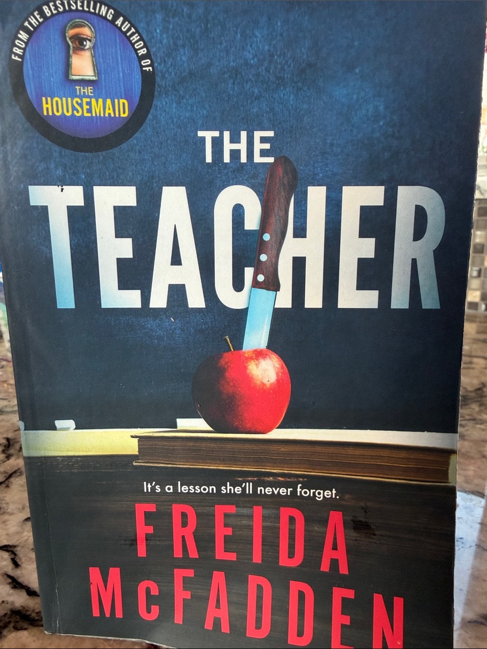 The Teacher by — Blue & Red Paperback Thriller